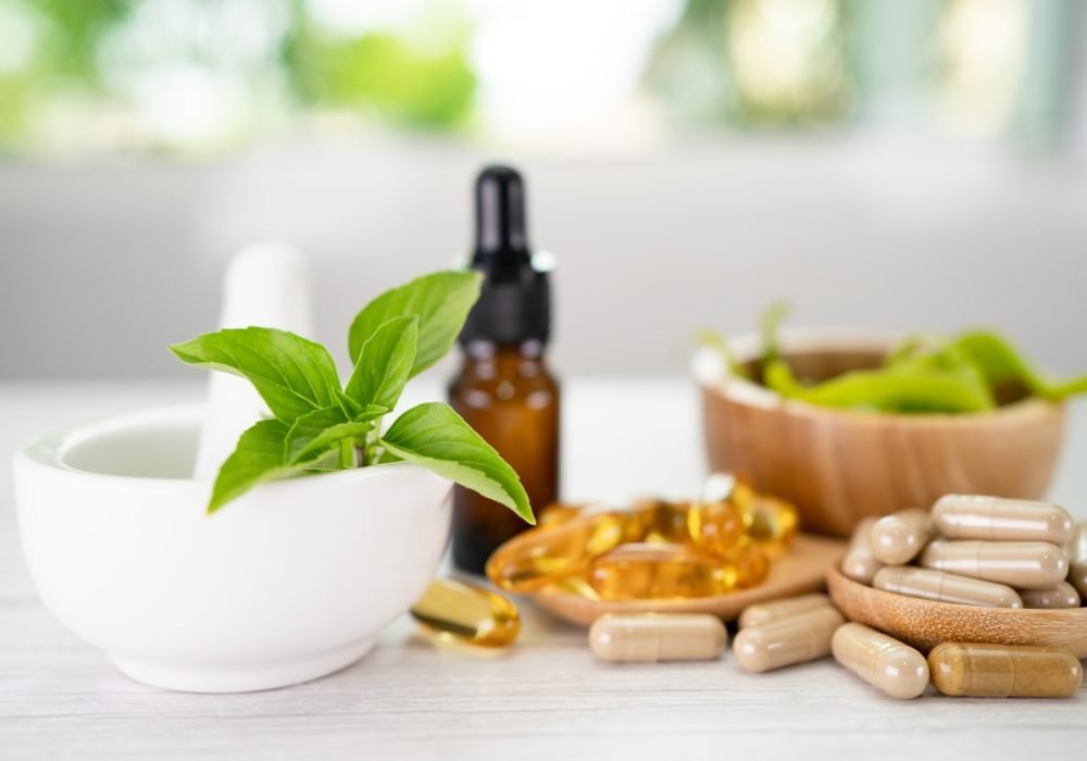 Alternative medicine herbal organic capsule with vitamin E omega 3 fish oil, mineral, drug with herbs leaf natural supplements for healthy good life.